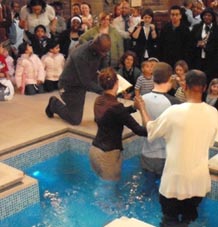 Paul Gale about to be baptised by Revd Fiona Robertson