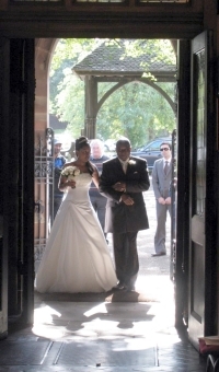 Bride and father at church door