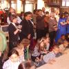 The children get a front row view of the baptisms