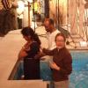 Raj awaits her immersion in the baptismal waters by Revd Fiona Robertson and Ken Costley