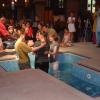 Fiona prays for Natalie after her baptism.