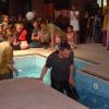 Natalie leaves the pool to dry off before she is confirmed.