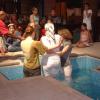 Tanice prepares to be baptised by Revds Fiona Robertson and Beverly Watson.