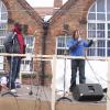Ivor Lewis and Heidi Bentley, two of the organisers, have a chat on stage