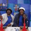 Mary Semper and Susan Robin relax with their badge presses